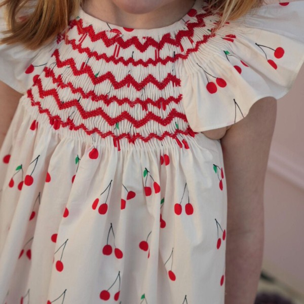 Indira Gandhi Flutter Dress Mon Cherry Cotton with a La Mode Hand Smocking Indira Gandhi Flutter Dress Mon Cherry Cotton with a La Mode Hand Smocking